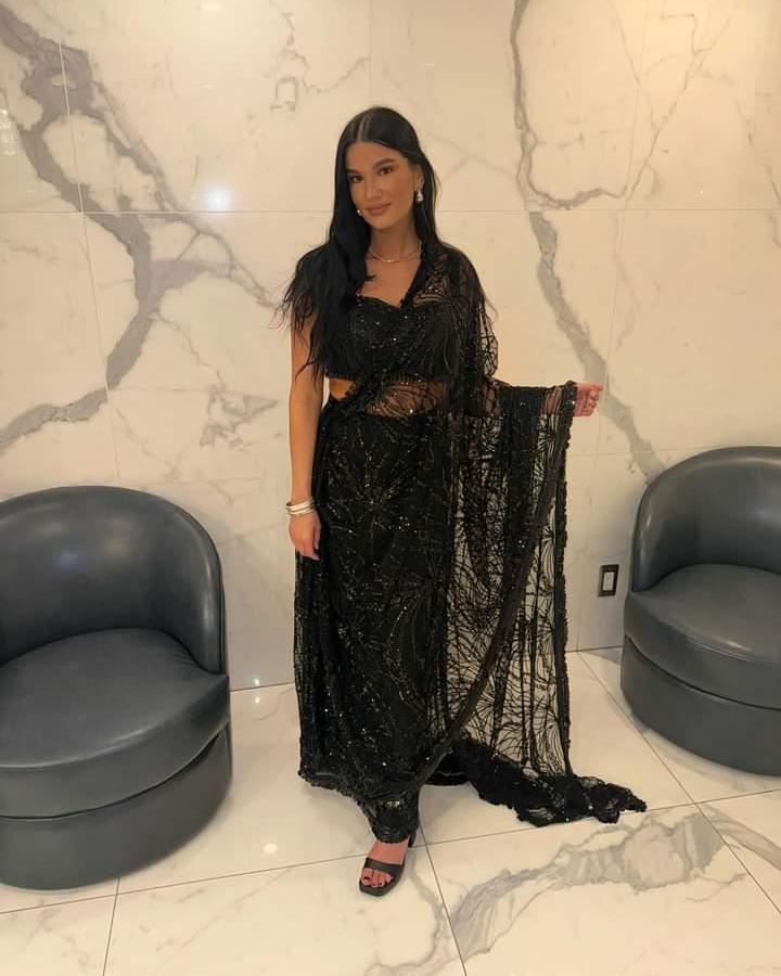 Leah Bennet wearing the Falak