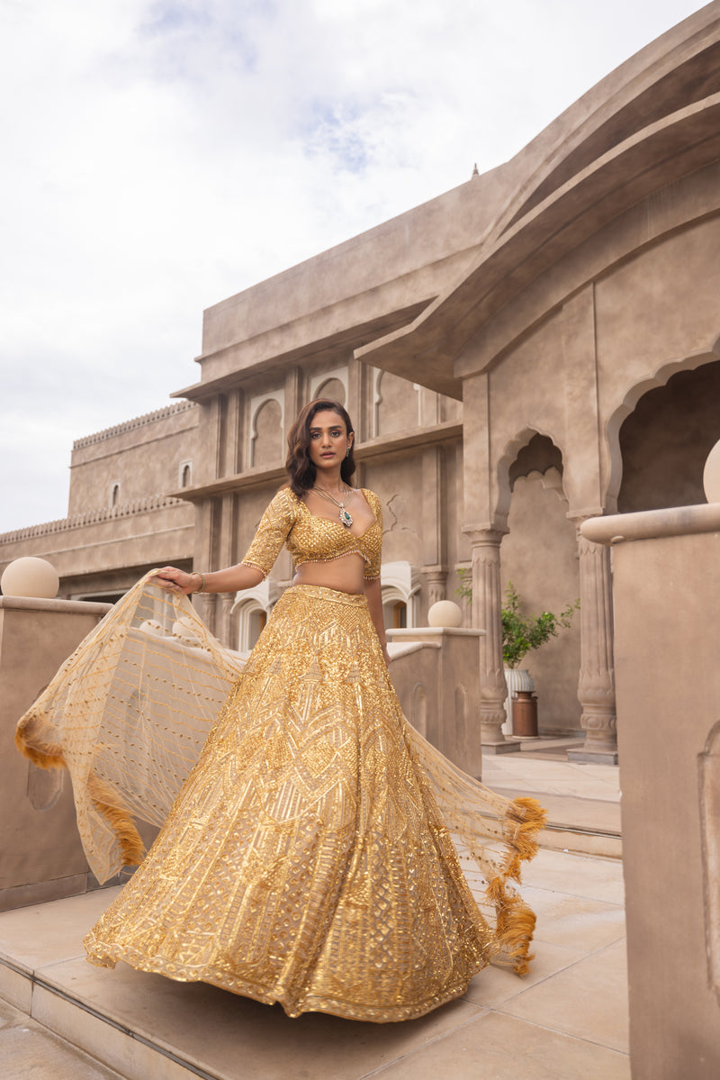 Lehenga Colour Palettes for Brides and What They Represent | Golden bridal  lehenga, Wedding lehenga designs, Indian wedding outfits